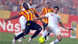 Esperance striker Yannick Ndjeng (left)