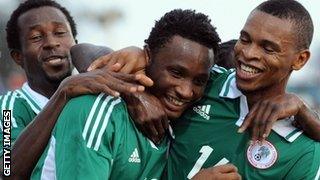 Jon Obi Mikel (centre) celebrates scoring for Nigeria