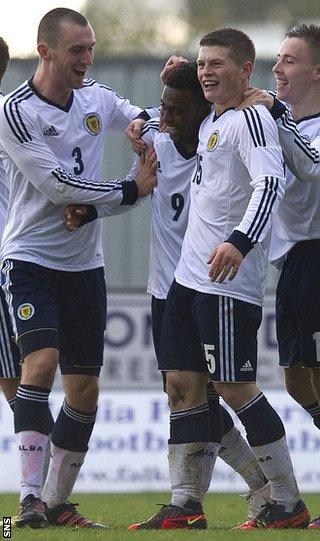 Fellow scorer Jo Chalmers (left) congratulates Feruz against Switzerland