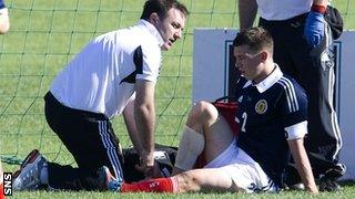 Jack lies injured while on Scotland Under-21 duty