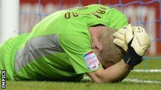 Sheffield Wednesday goalkeeper Chris Kirkland after he was attacked by a supporter