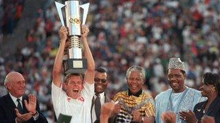 Neil Tovey lifts the Africa Cup of Nations