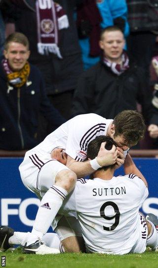 Darren Barr congratulates Hearts goalscorer Darren Barr