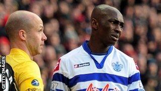 Stephane Mbia reacts after being sent off against Arsenal