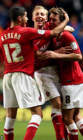 Charlton's Dale Stephens (right) is mobbed after scoring his side's third goal