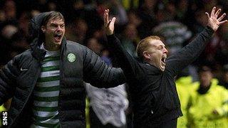 Celtic manager Neil Lennon (right) celebrates a famous win