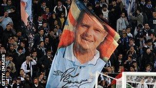 Lazio supporters display a banner featuring Gascoigne