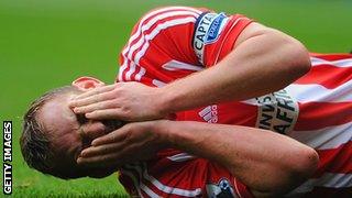 Black Cats' captain Cattermole was injured putting in a cross during the 4-2 loss to West Brom