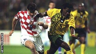 Jamaica's Ian Goodison tackles Davor Suker of Croatia during the 1998 World Cup