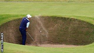 Former Open champion Ben Curtis struggles with the infamous Road Bunker