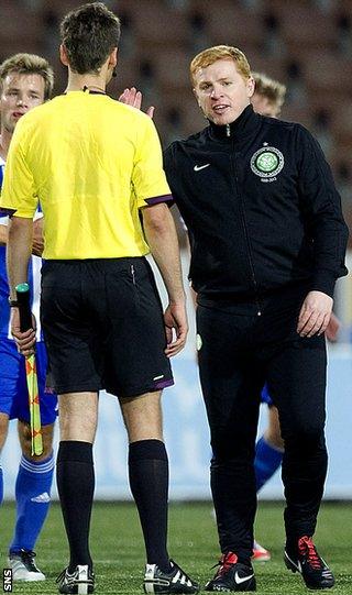 Lennon discusses a decision with an official