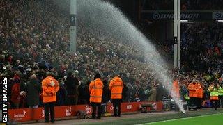 Faulty sprinkler by the side of the Anfield pitch