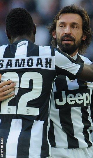 Kwadwo Asamoah and Andrea Pirlo celebrate with Juventus