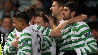 Kris Commons and Celtic team-mates celebrate winner against Spartak Moscow