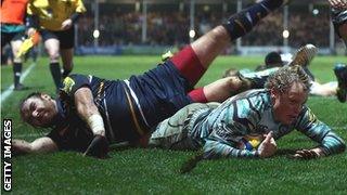 Andy Goode collides with Leicester wing Scott Hamilton as he scores on Friday