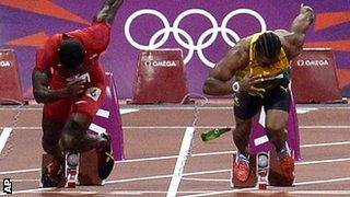 A bottle lands on the 100m track