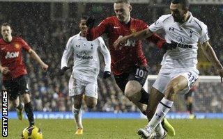 Wayne Rooney goes to ground