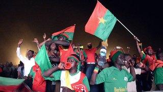 Burkina Faso fans celebrate victory at a viewing centre in Ouagadougou