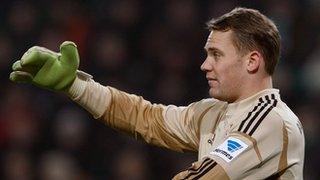 Bayern Munich's Manual Neuer with his four-fingered goalkeeping glove