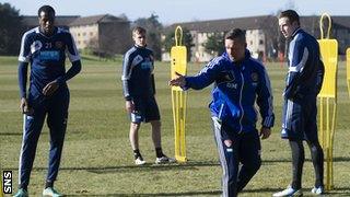 Darren Murray oversees Hearts training