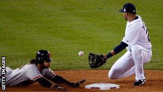 San Francisco Giants' Fernando Crawford steals second base against Jhonny Peralta of the Detroit Tigers