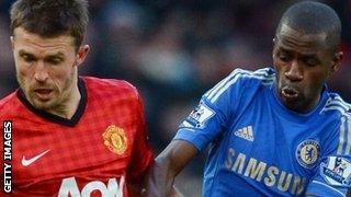 Manchester United midfielder Michael Carrick battles with Ramires