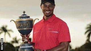 Tiger Woods lifts World Gold Championships trophy