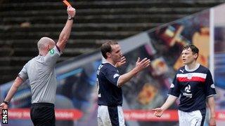 Dundee defender Gary Irvine is sent off by Referee Bobby Madden