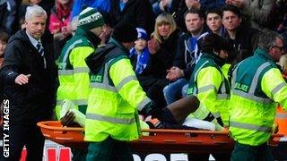 Newcastle boss Alan Pardew consoles Massadio Haidara as he is stretchered off