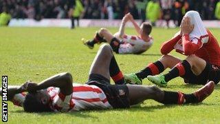 Brentford's players are left stunned by Coppinger's dramatic winner