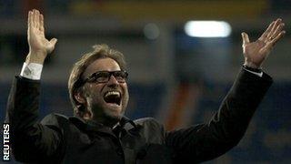 Borussia Dortmund coach Jurgen Klopp celebrates at the final whistle