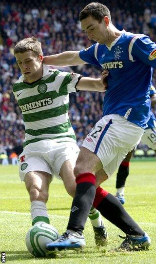 Celtic's Adam Matthews tussles with Rangers defender Lee Wallace