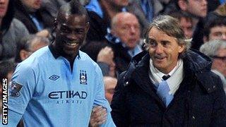 Mario Balotelli and Roberto Mancini