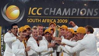 Australia's players lift the Champions Trophy