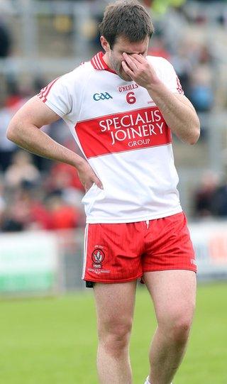 Dejected Derry captain Mark Lynch at the final whistle after the quarter-final defeat by Down