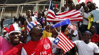 Liberia fans rally their team during Sunday's match against Senegal