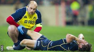 Scotland's Peter Horne receives treatment