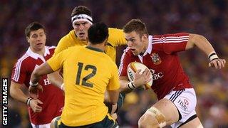 Dan Lydiate takes on the Australia defence