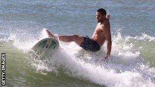 Sean Maitland surfing