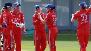 England's Susie Rowe (centre) is congratulated after a run-out