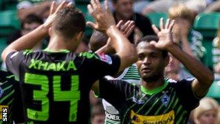 Granit Xhaka (left) celebrates scoring against Celtic