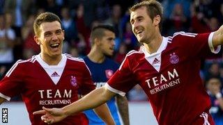 Ryan Jack and Niall McGinn celebrate for Aberdeen