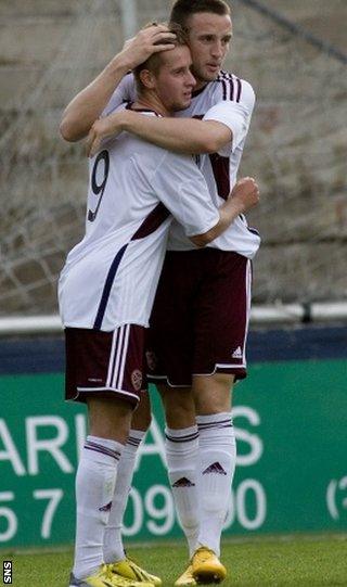 Billy King (left) celebrates scoring for Hearts