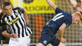 John McGinn challenges Conor Newton at St Mirren Park