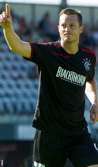 Jon Daly celebrates with Rangers