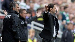 Dundee United manager Jackie McNamara watches his side in action against Celtic