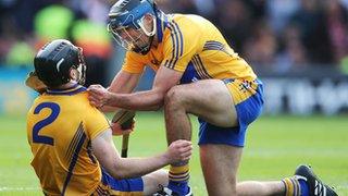 Domhnall O'Donovan is congratulated by Brendan Bulger after his last gasp equalizer earns Clare a replay in All-Ireland hurling final