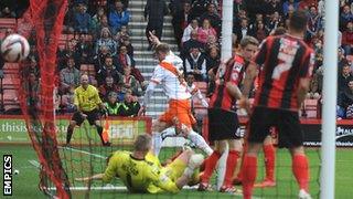 Neal Bishop scores the winning goal for Blackpool at Bournemouth