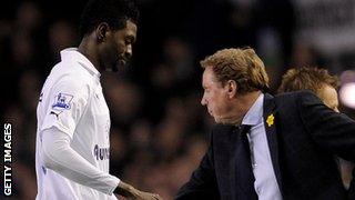 Emmanuel Adebayor and Harry Redknapp