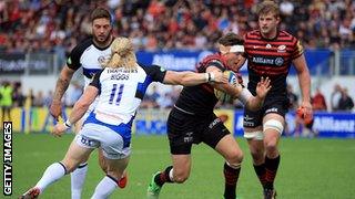 Saracens' Alex Goode dives over to score a try during their match against Bath